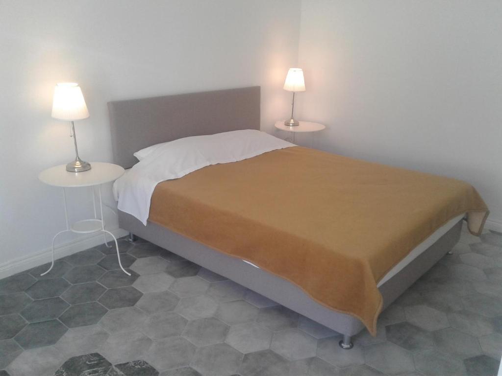 A bed or beds in a room at Filenia