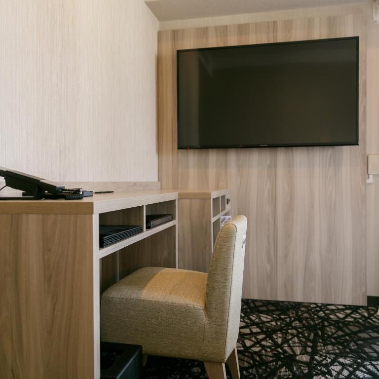 TV a/nebo společenská místnost v ubytování Hotel Mystays Kagoshima Tenmonkan Annex
