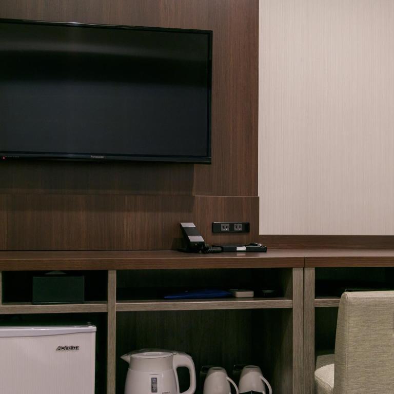 TV a/nebo společenská místnost v ubytování Hotel Mystays Kagoshima Tenmonkan Annex