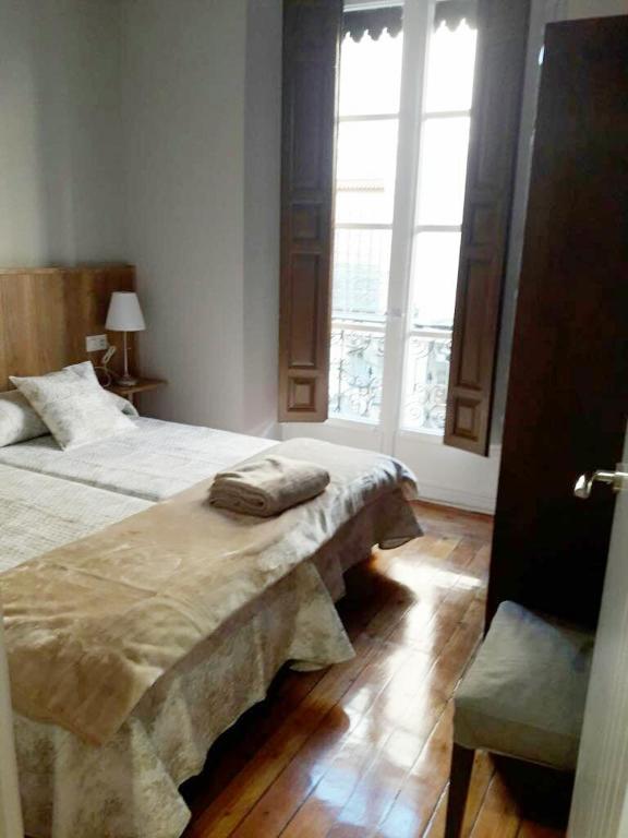 Posteľ alebo postele v izbe v ubytovaní Casa Condal de Reyna