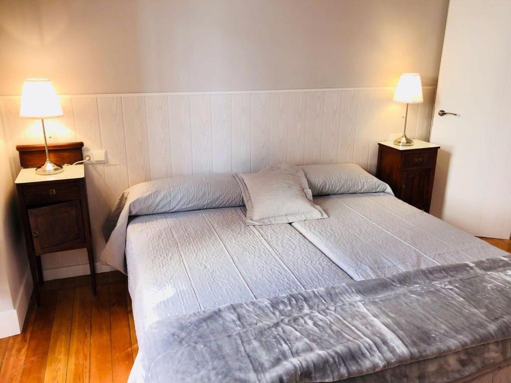Posteľ alebo postele v izbe v ubytovaní Casa Condal de Reyna