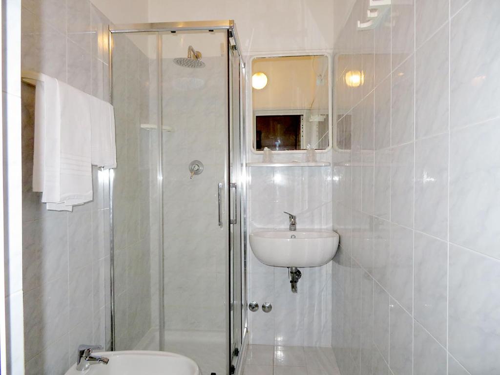 Koupelna v ubytování Albergo La Perla