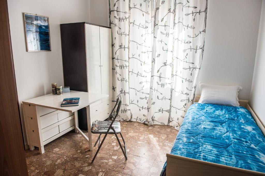 Postel nebo postele na pokoji v ubytování Piazza Ginnasio Affittacamere