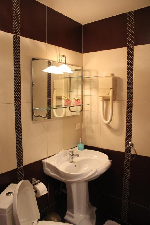 Koupelna v ubytování Hotel Adria