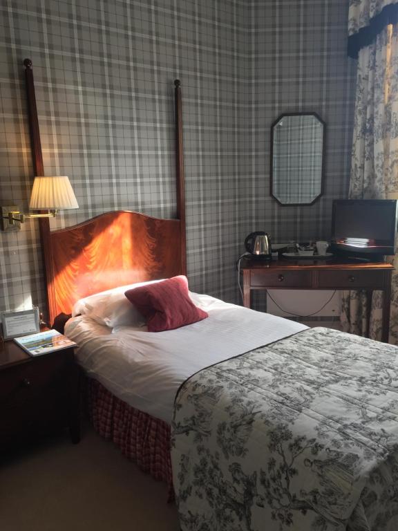 Postel nebo postele na pokoji v ubytování Glenburnie House