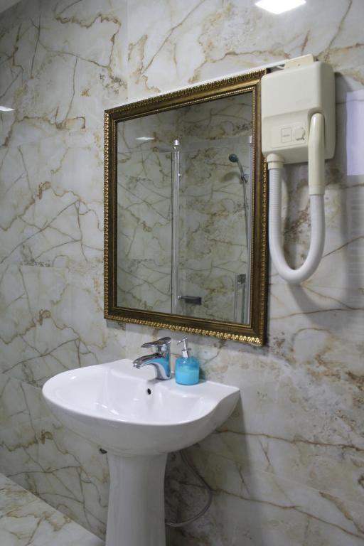 Koupelna v ubytování Hotel Adria