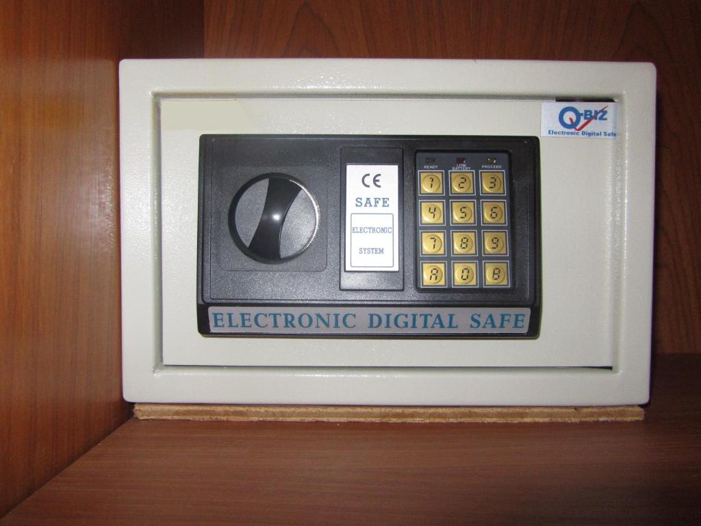 an electronic digital safe is sitting on a table at Grand View in Patong Beach