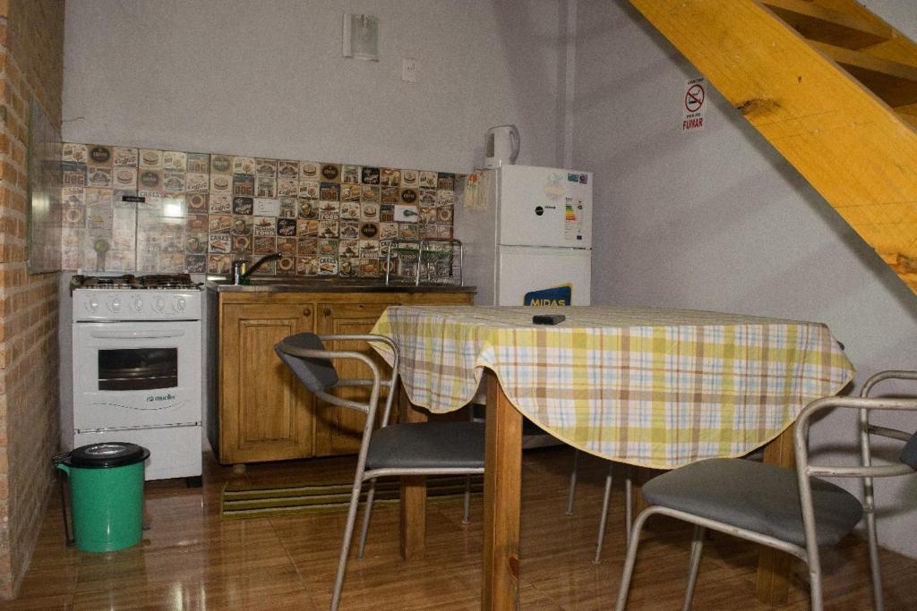 Kuchyň nebo kuchyňský kout v ubytování Duplex Macuco