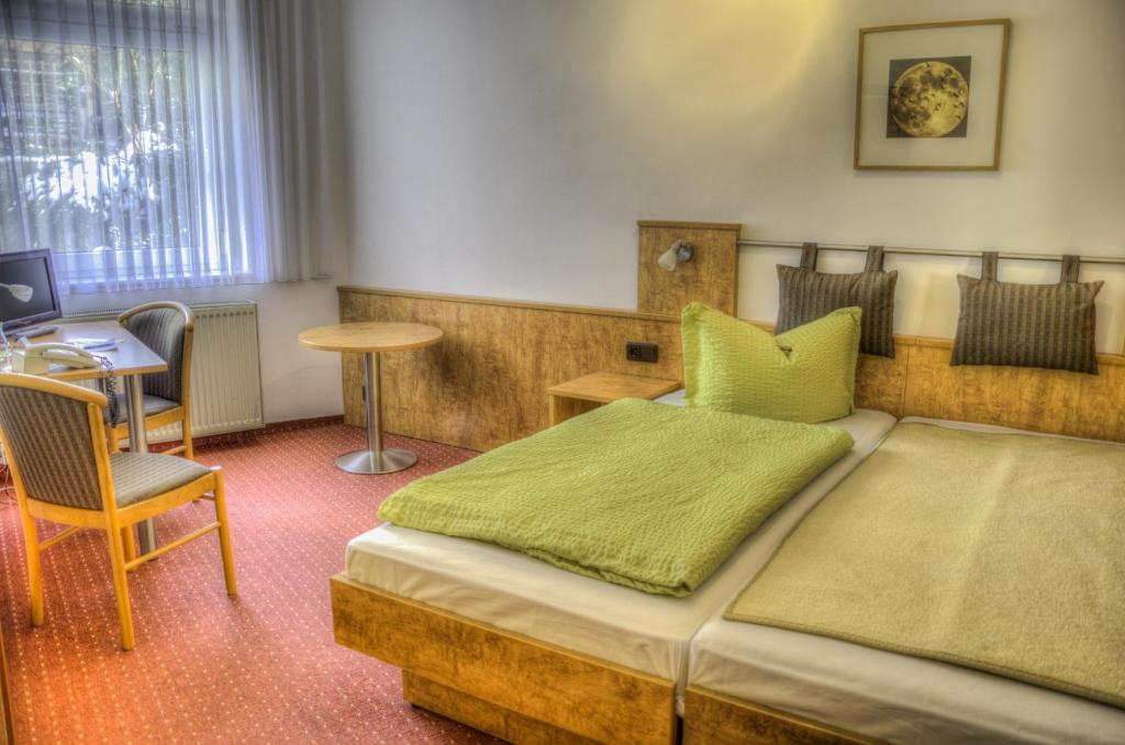 Postel nebo postele na pokoji v ubytování Spree-Pension