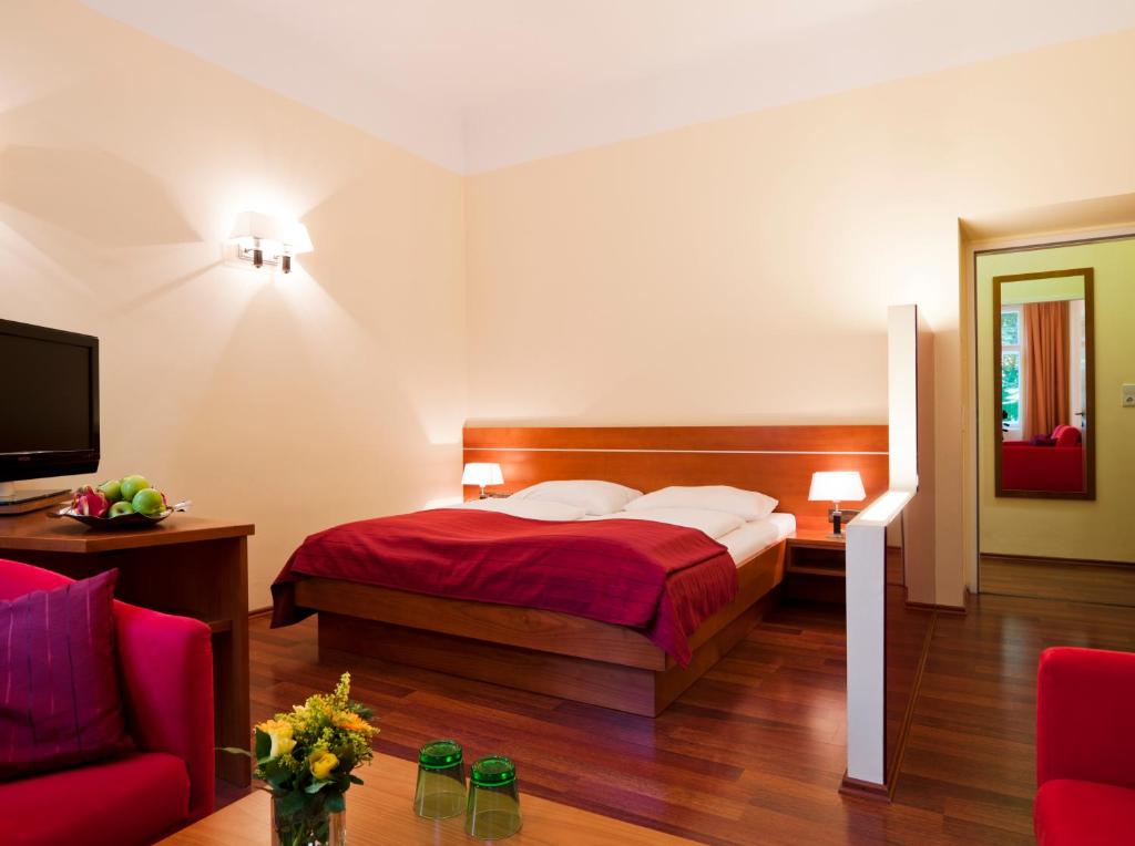 Llit o llits en una habitació de Hotel Zipser