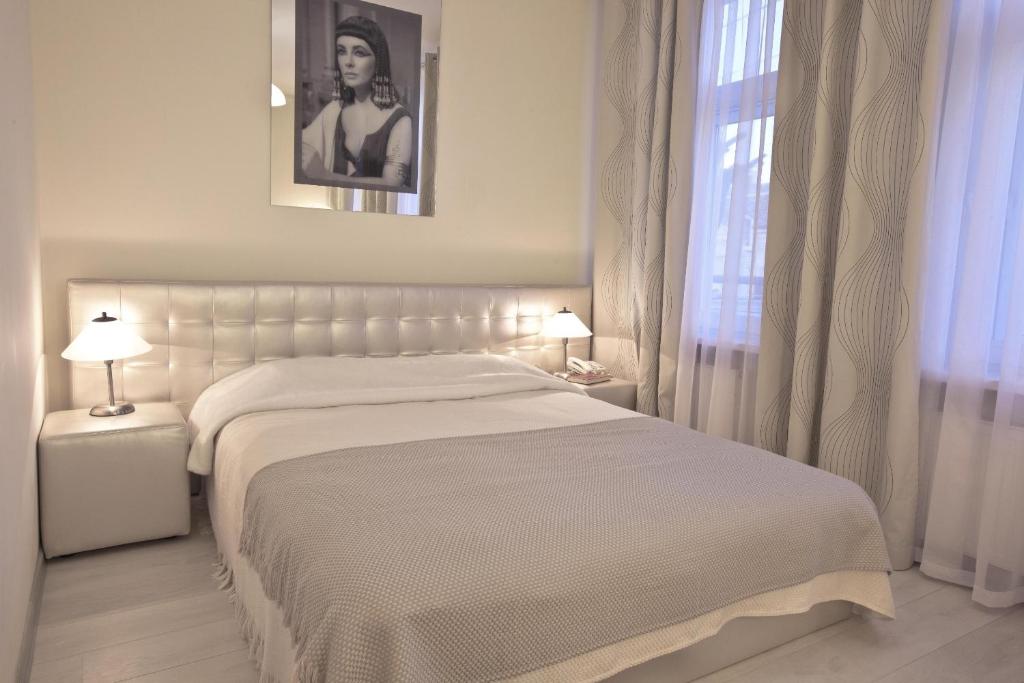 Postel nebo postele na pokoji v ubytování Hotel Dom Aktera