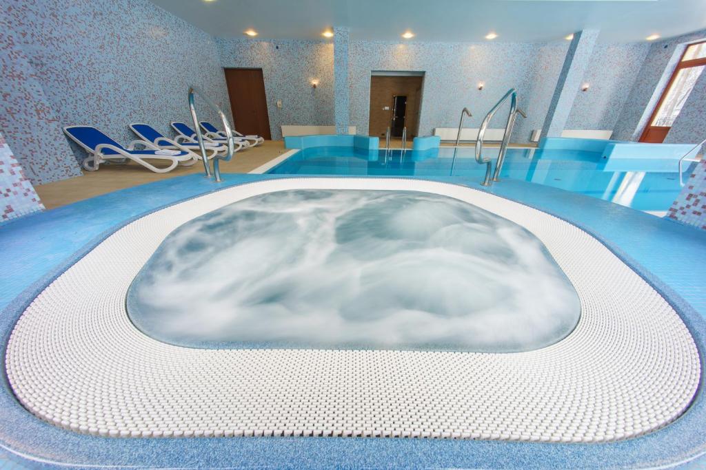 Bazén v ubytovaní Hotel Pan Tadeusz alebo v jeho blízkosti