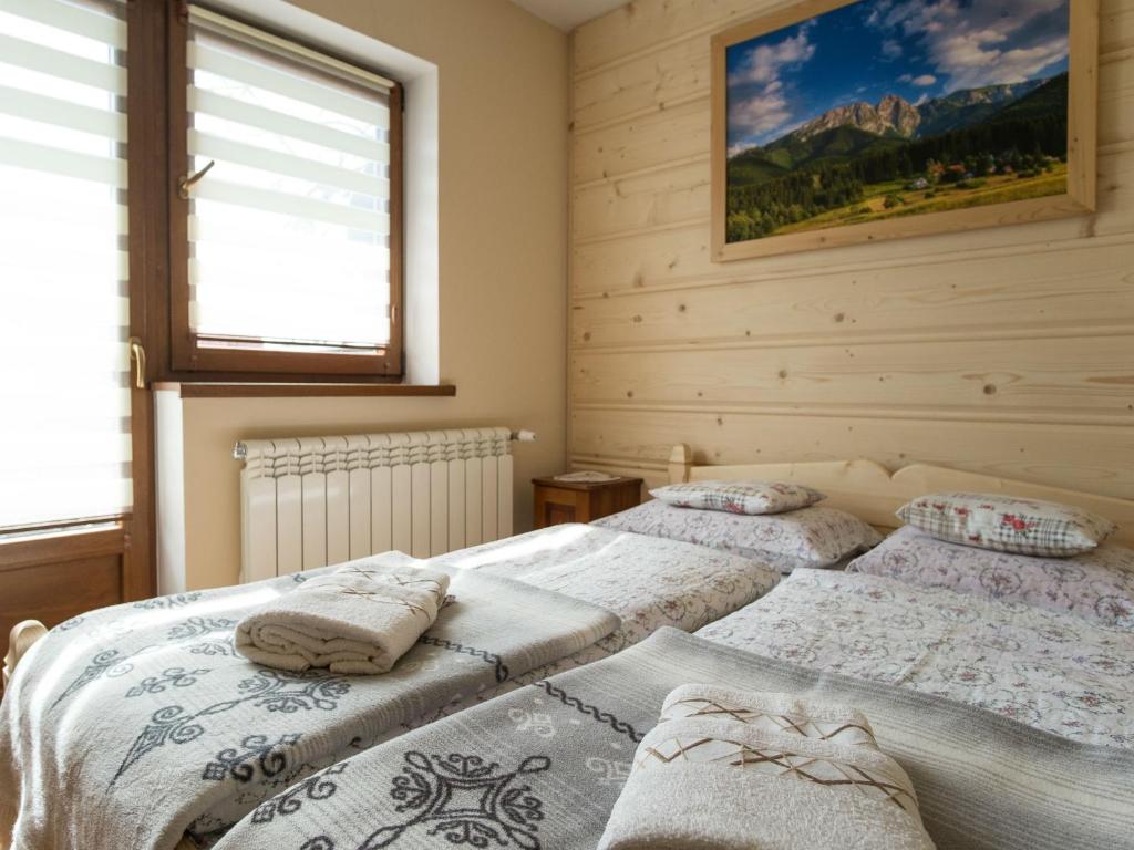 Posteľ alebo postele v izbe v ubytovaní Willa Daglezja