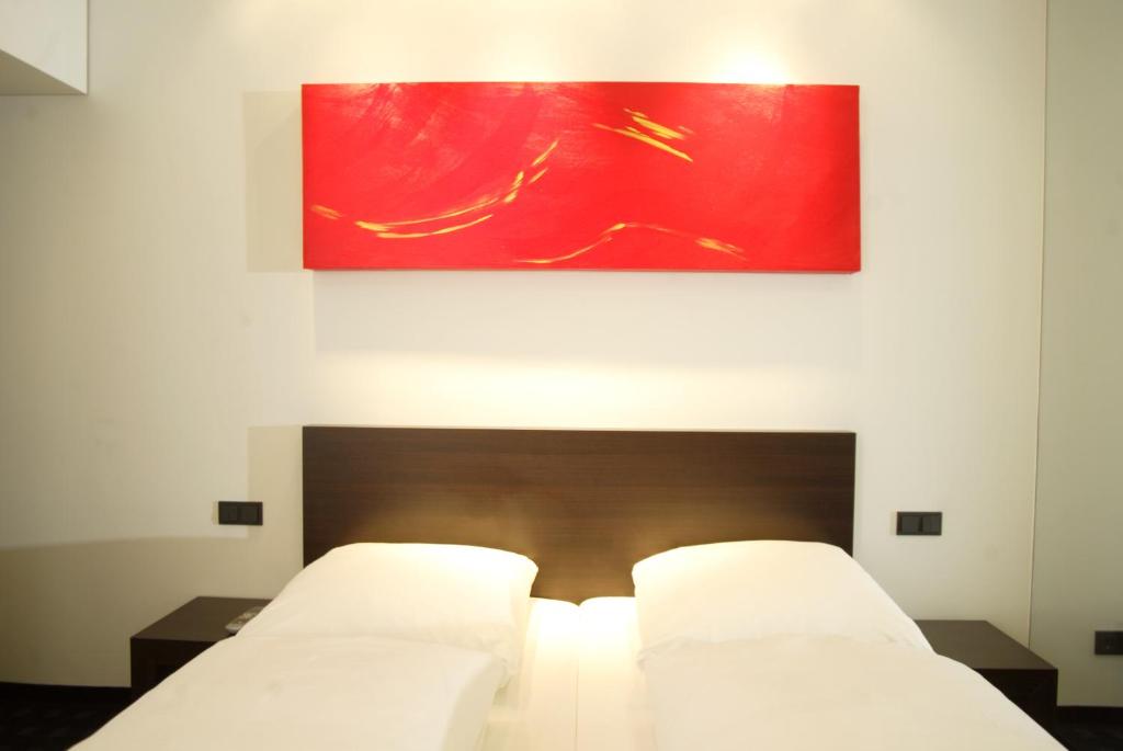 Postel nebo postele na pokoji v ubytování Ara Hotel Comfort