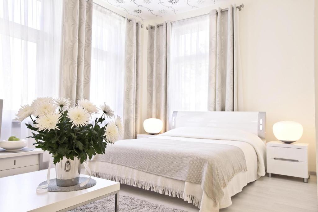 Postel nebo postele na pokoji v ubytování Hotel Dom Aktera