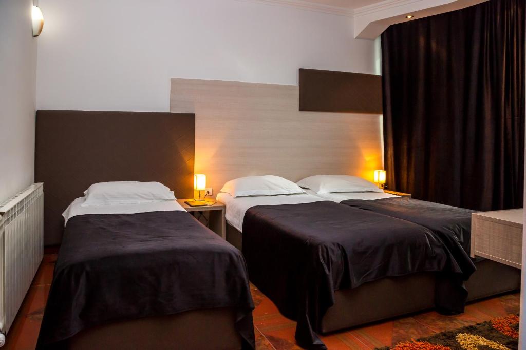 Postel nebo postele na pokoji v ubytování Hotel S
