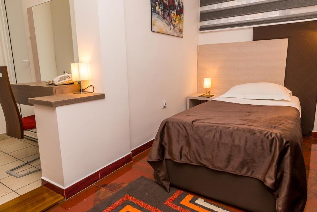 Postel nebo postele na pokoji v ubytování Hotel S