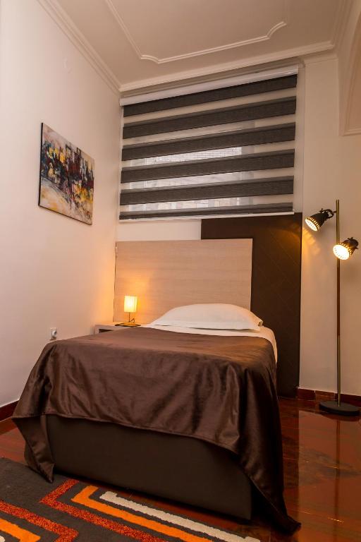 Postel nebo postele na pokoji v ubytování Hotel S