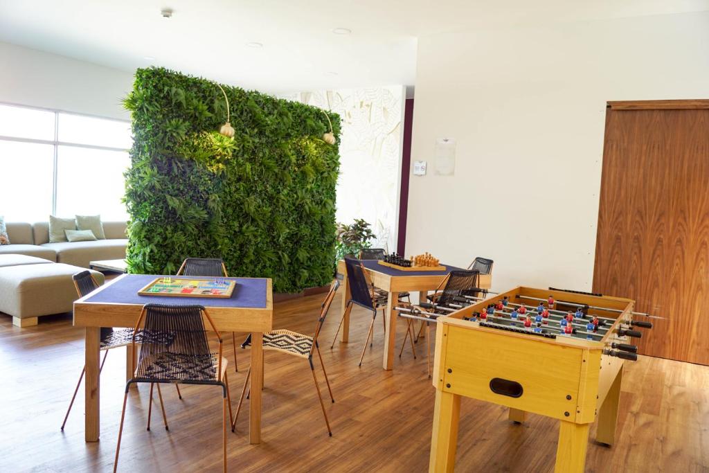 Posezení v ubytování Hotel Factory Green Bogotá