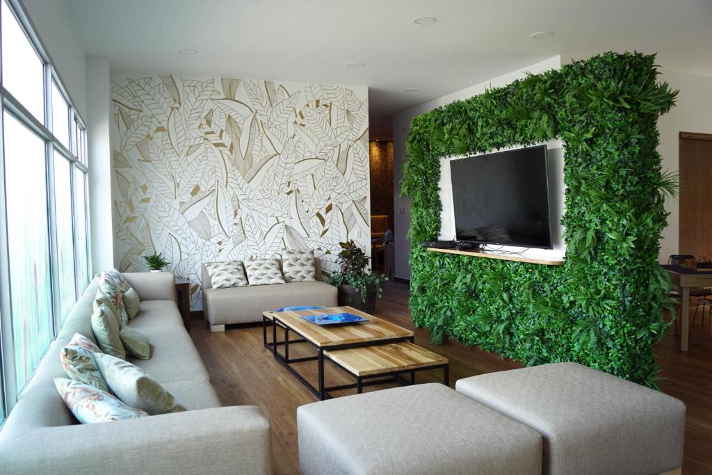 TV a/nebo společenská místnost v ubytování Hotel Factory Green Bogotá