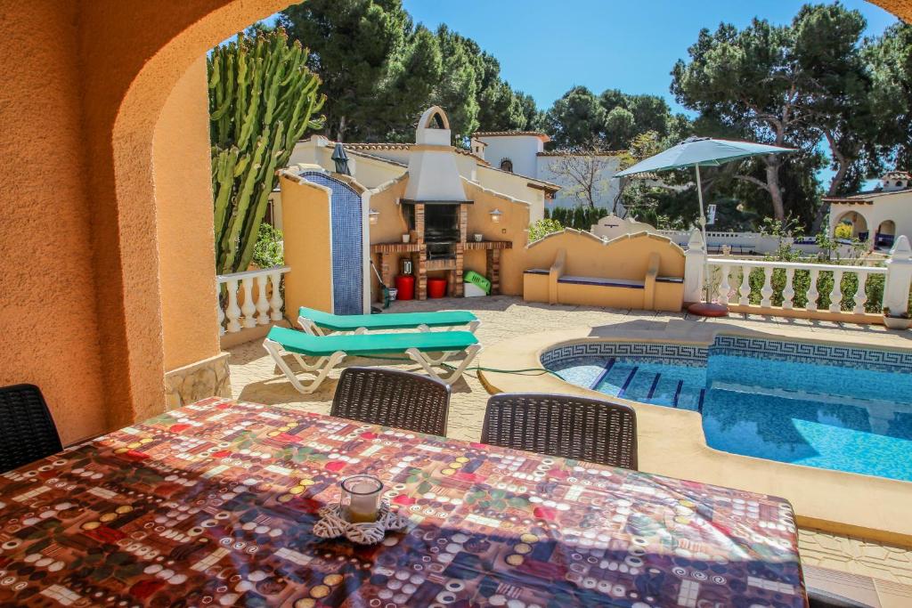 Bazén v ubytovaní Sofia - holiday home with private swimming pool in Moraira alebo v jeho blízkosti