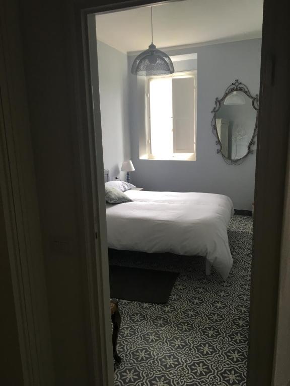 A bed or beds in a room at La Nipitella