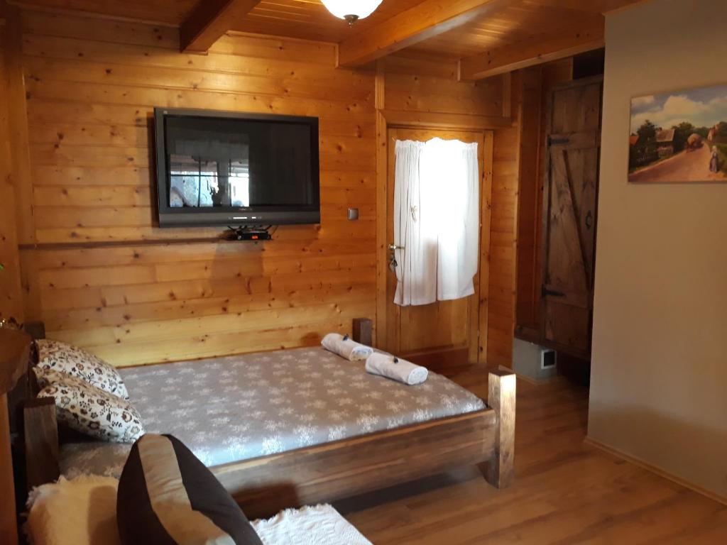 Postel nebo postele na pokoji v ubytování Willa pod Jemiołą
