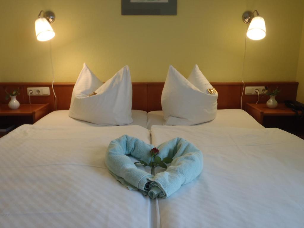 Voodi või voodid majutusasutuse Hotel Wutzler toas