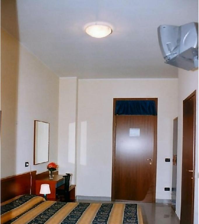 Cama o camas de una habitación en Hotel Greco