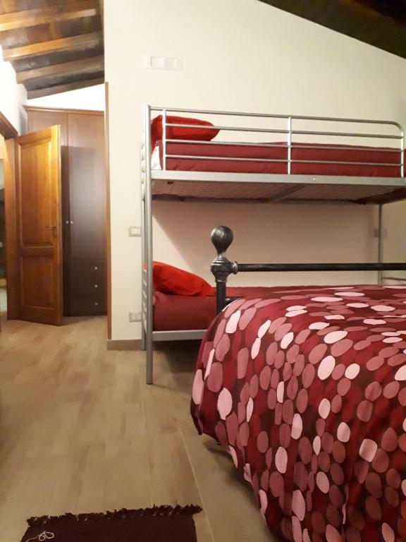 Postel nebo postele na pokoji v ubytování La Camelia B&B
