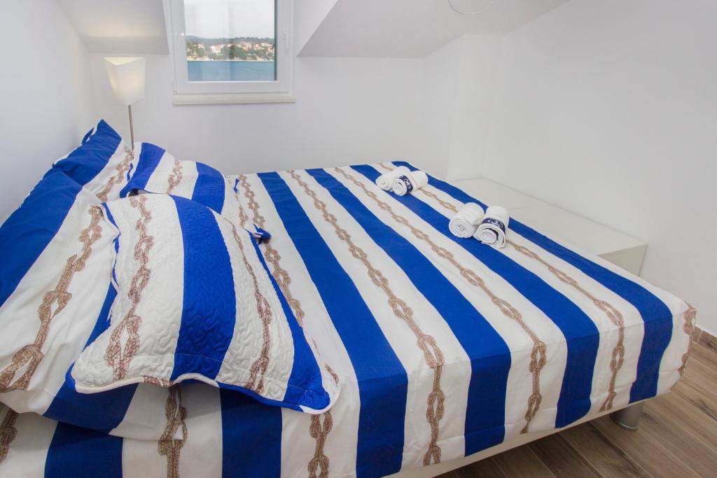 Postel nebo postele na pokoji v ubytování Riva