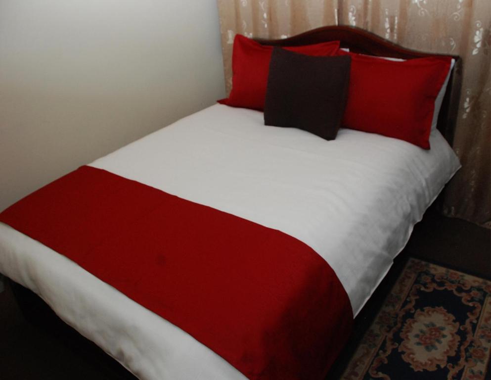 Postel nebo postele na pokoji v ubytování Hotel Bonaventure