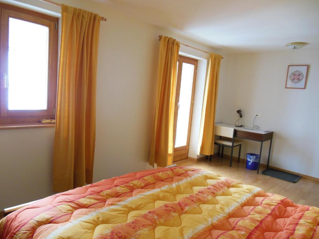 Postel nebo postele na pokoji v ubytování B&B Casa Moni