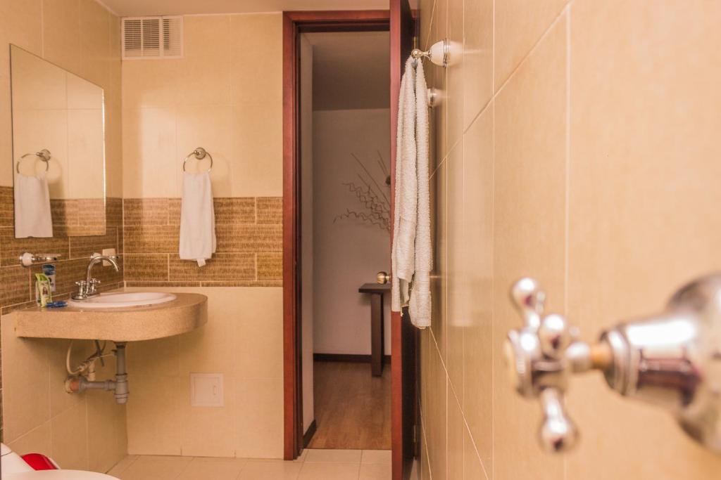 Koupelna v ubytování Nogal Suite Hotel Pasto