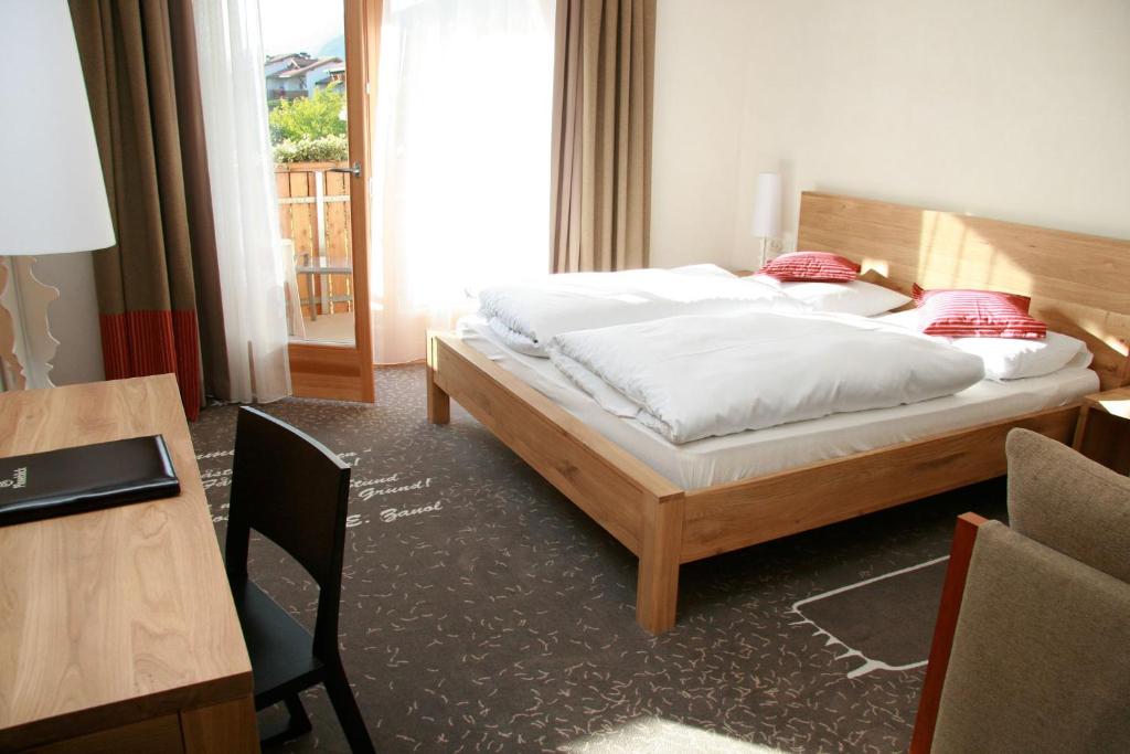 Posteľ alebo postele v izbe v ubytovaní Hotel Ploseblick