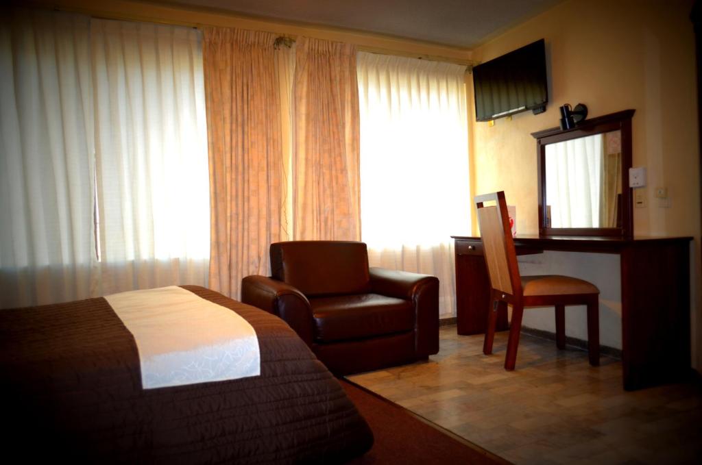 TV a/nebo společenská místnost v ubytování Hotel Flamingo Kristal