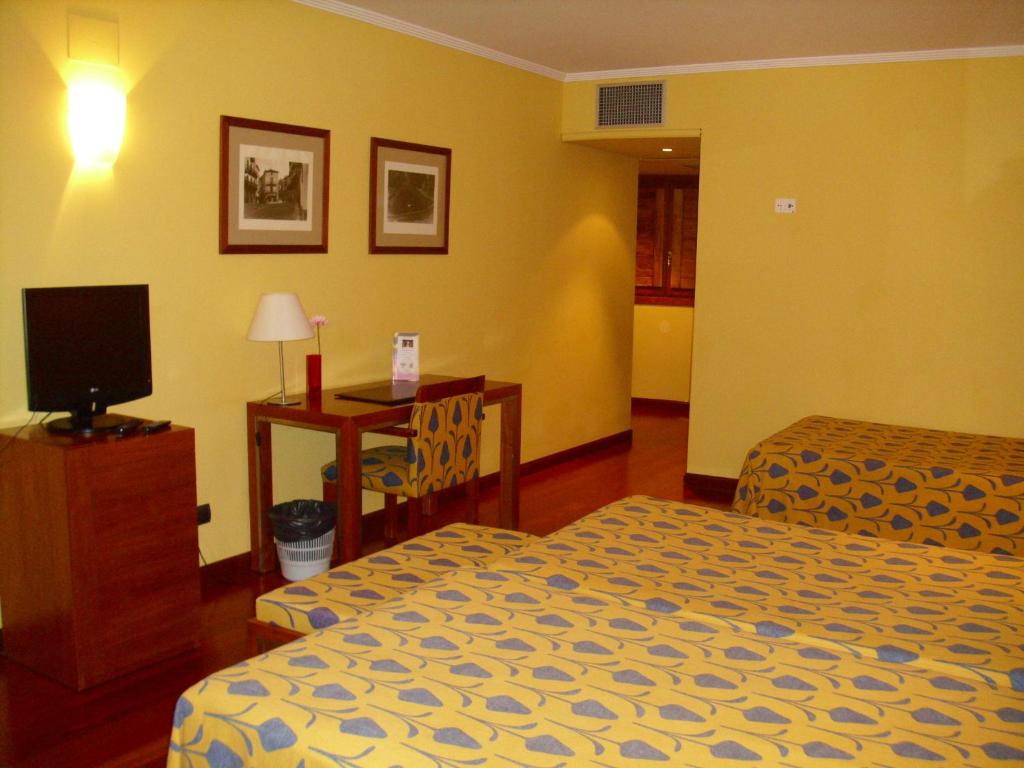 Postel nebo postele na pokoji v ubytování Hotel Rural Vado del Duratón