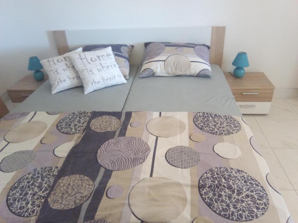 Posteľ alebo postele v izbe v ubytovaní Apartmani Fran Vir