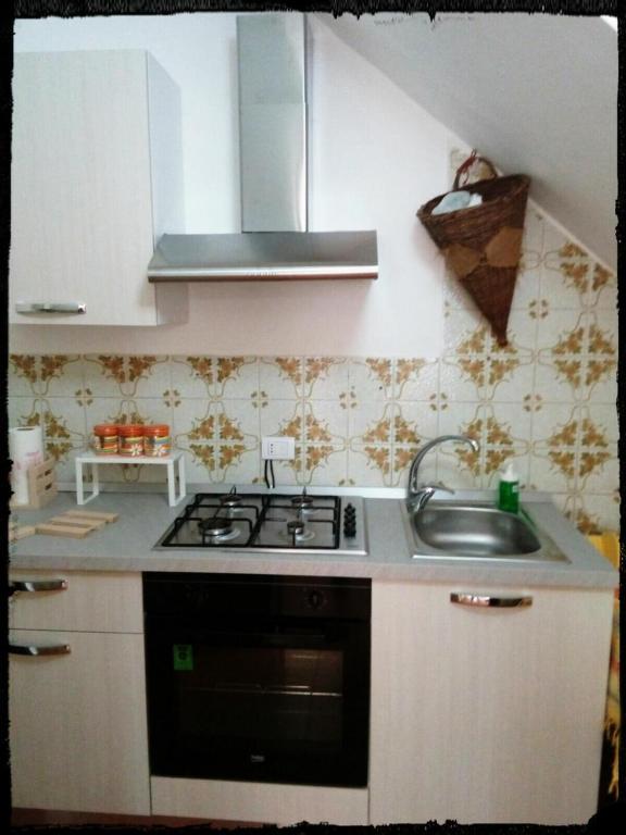 Kuchyň nebo kuchyňský kout v ubytování La Badia