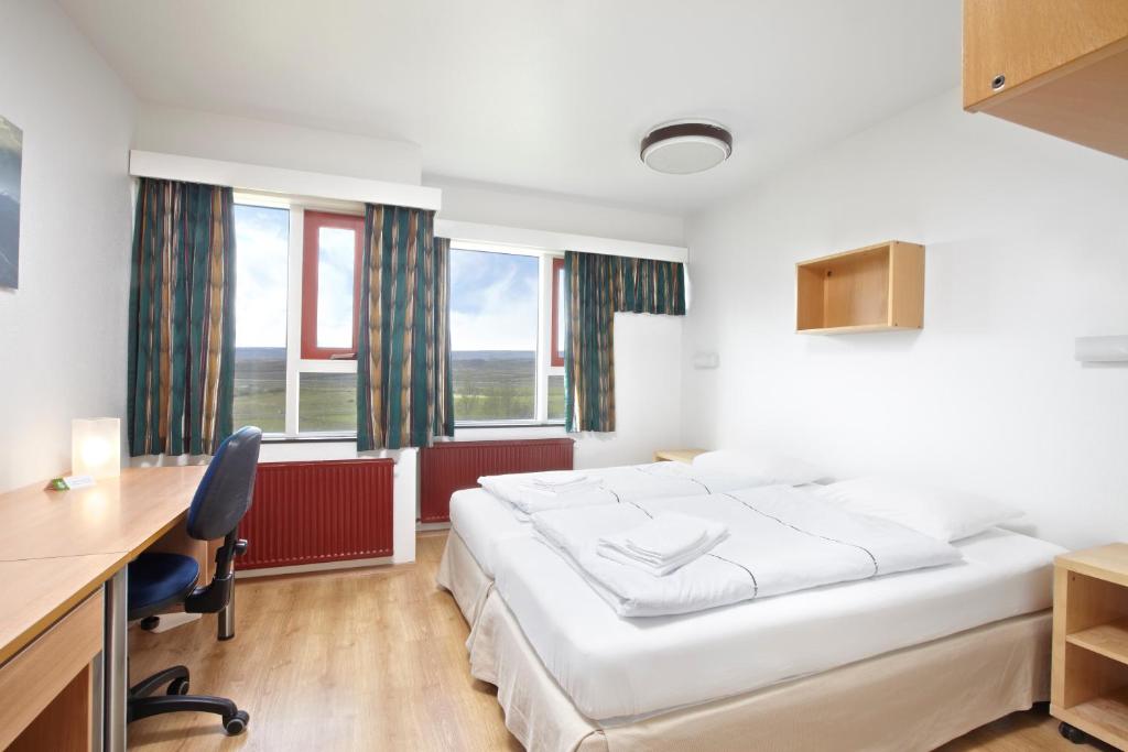 Llit o llits en una habitació de Hotel Edda Egilsstadir