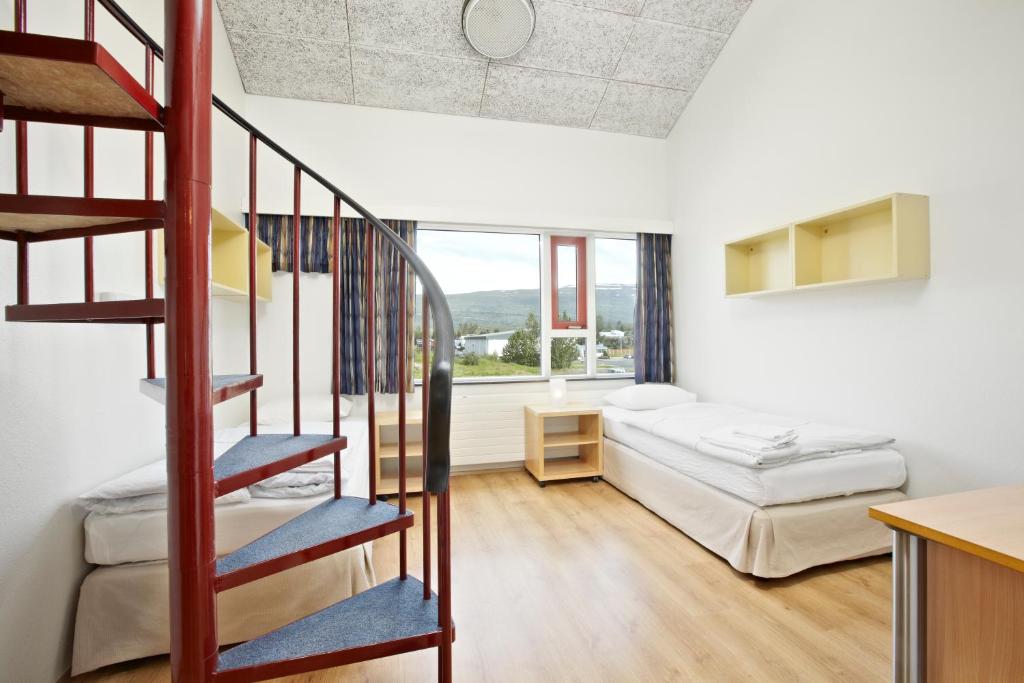 Llit o llits en una habitació de Hotel Edda Egilsstadir