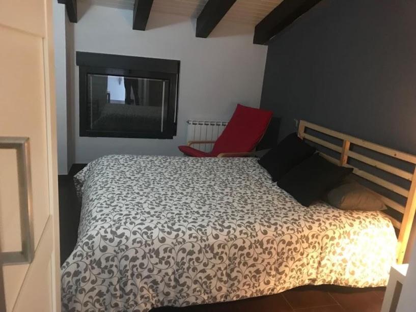 מיטה או מיטות בחדר ב-Casa Millán