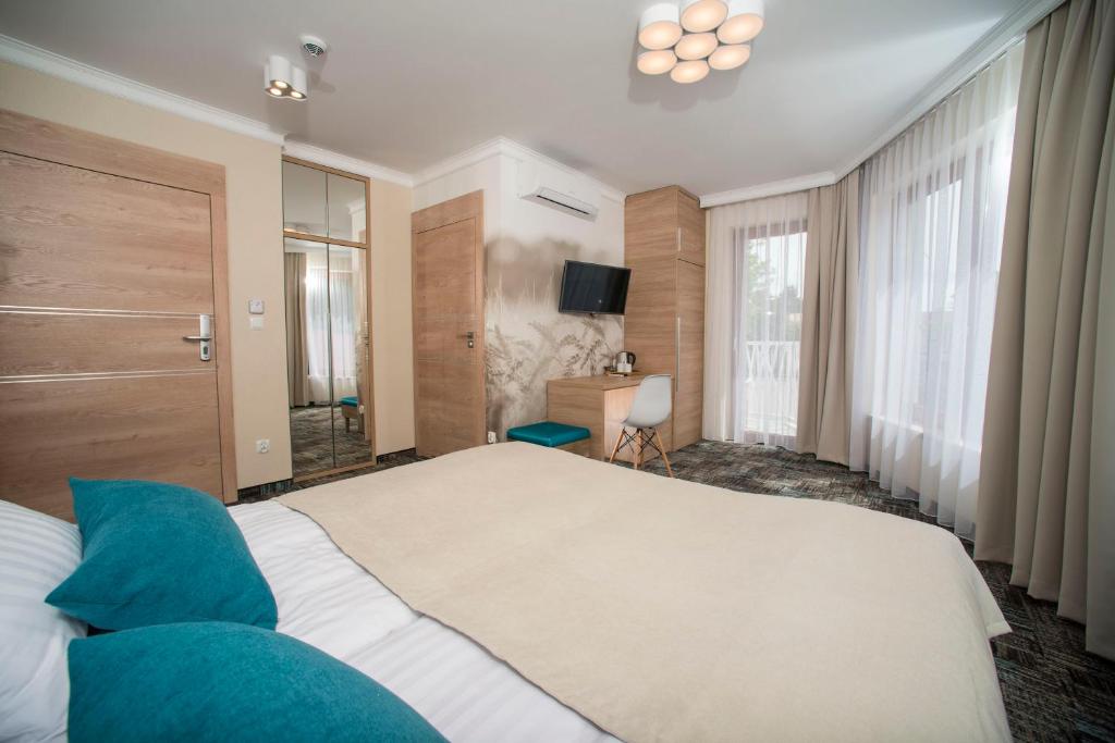 Villa Marlena Centrum-kawa,herbata i soki dostępne całą dobę w cenie pokoju - Dubbele Of Dubbele Kamer Met Balkon