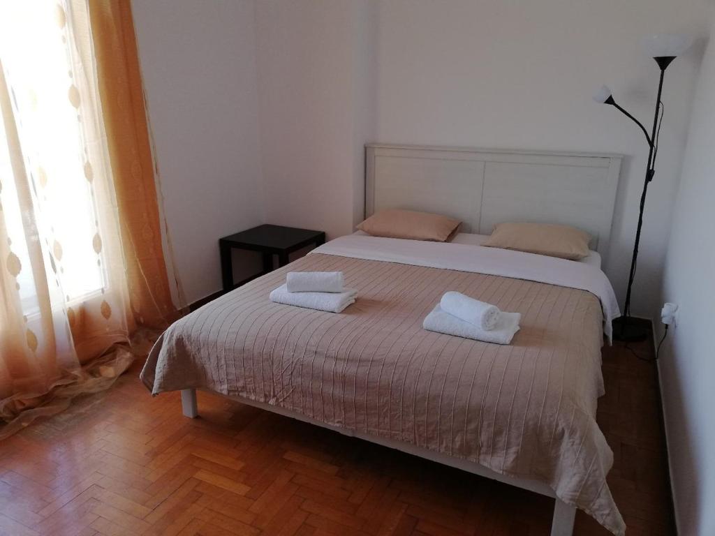 Posteľ alebo postele v izbe v ubytovaní Sfiggos 54 Guest House