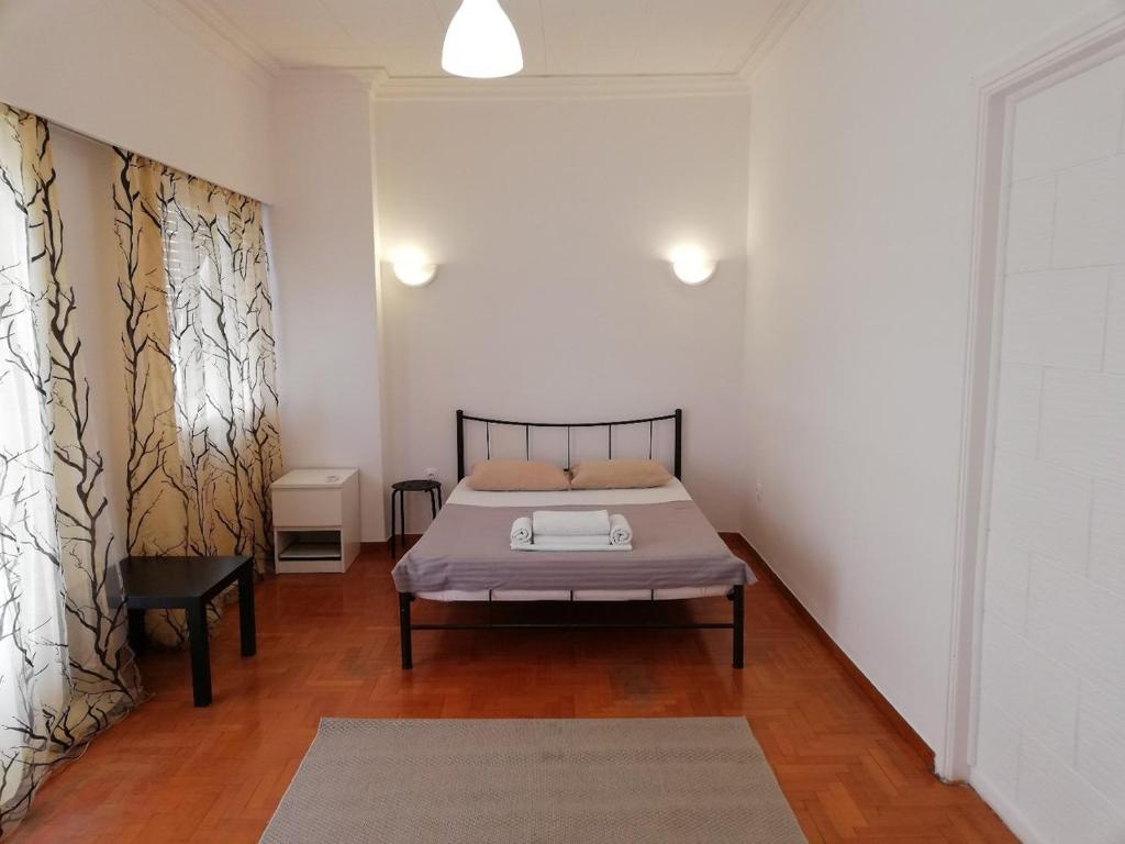 Posteľ alebo postele v izbe v ubytovaní Sfiggos 54 Guest House