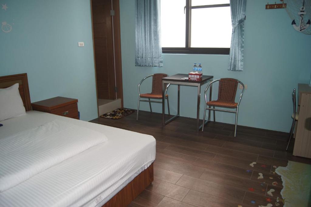 Postel nebo postele na pokoji v ubytování Shimmer B&B