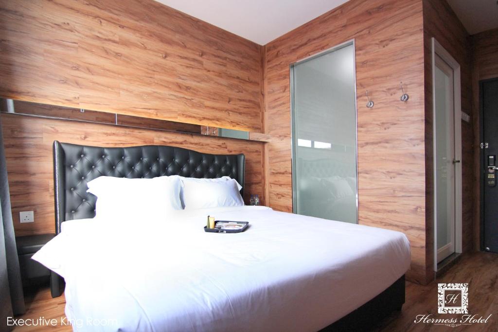 Postel nebo postele na pokoji v ubytování Hermess Hotel Johor