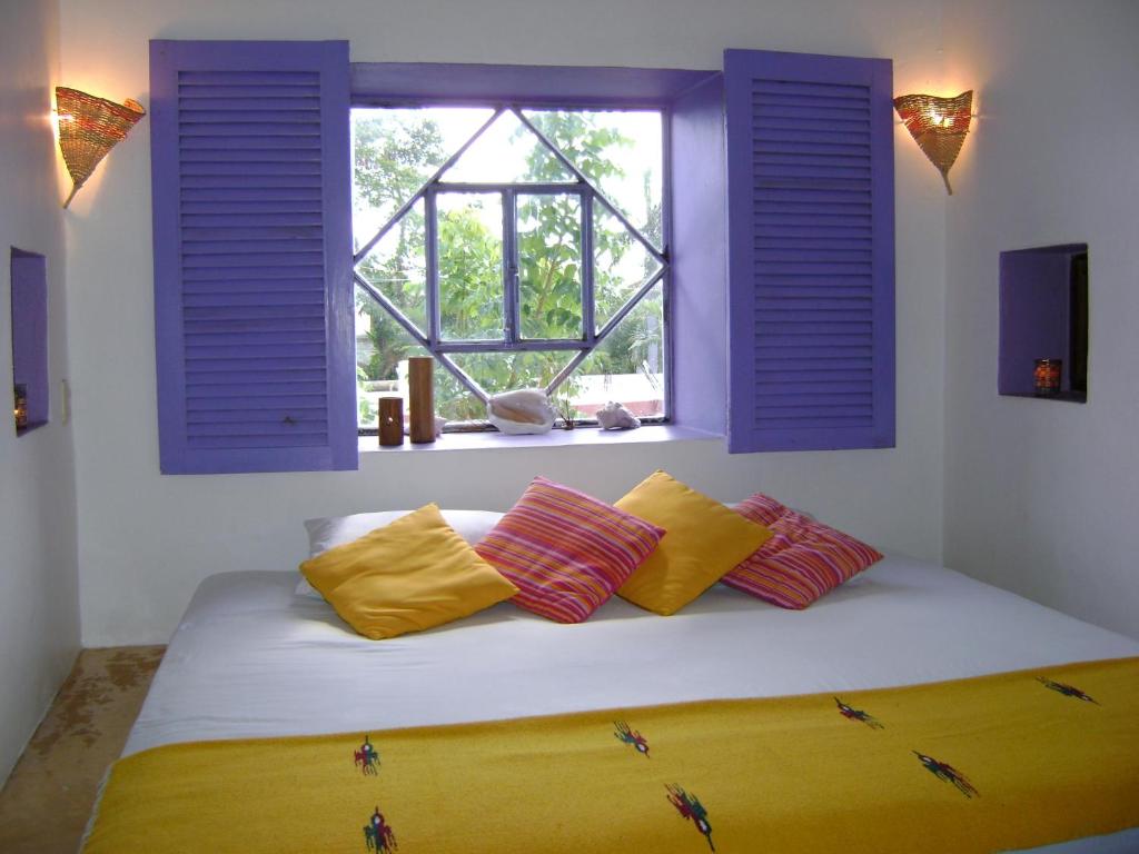 Postel nebo postele na pokoji v ubytování Amaranto Bed and Breakfast