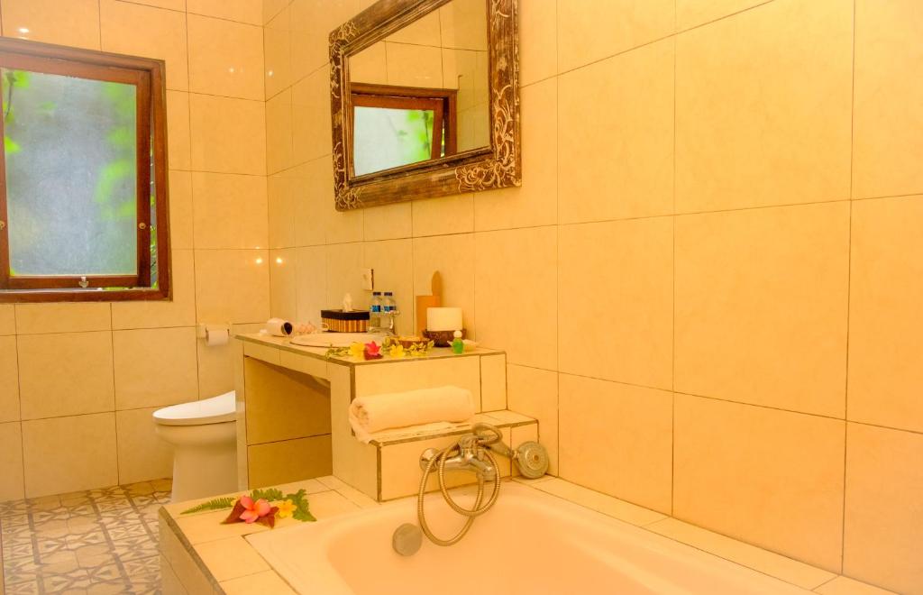 Koupelna v ubytování Semujan Bungalow