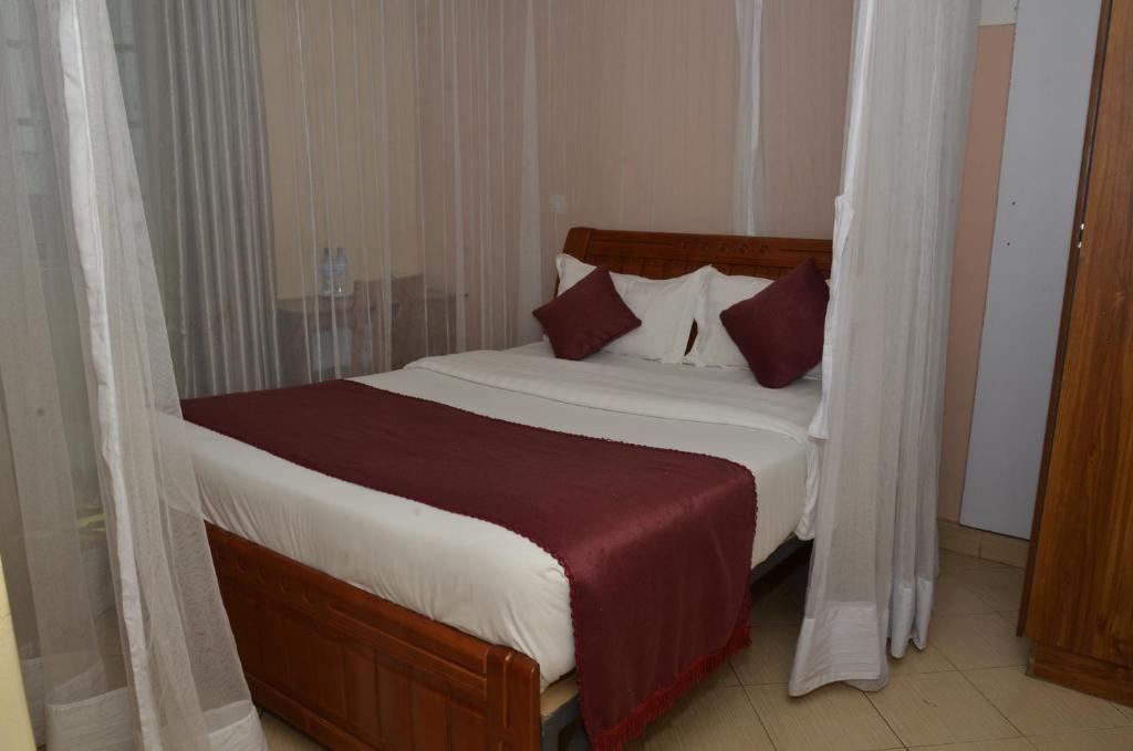Postel nebo postele na pokoji v ubytování Decasa Hotel